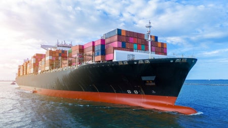 Side view of a loaded cargo ship 