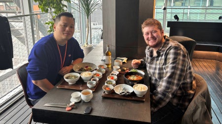 Two men sitting at a restaurant table 