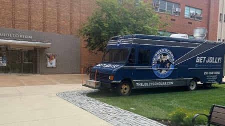 The Road Scholar parked outside of Strosacker Auditorium