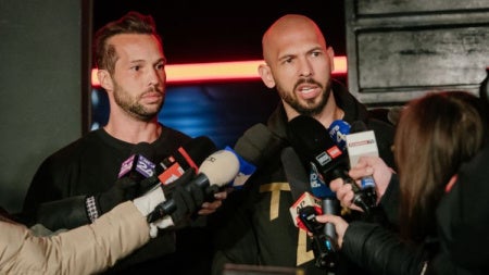 Image of Tate brothers talking to the media