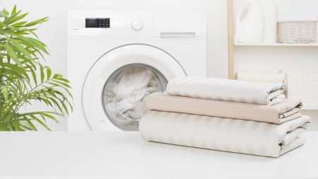 Image of clean folded bedsheets
