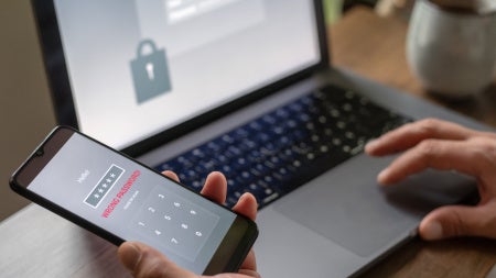 Image of a laptop and phone with password protection