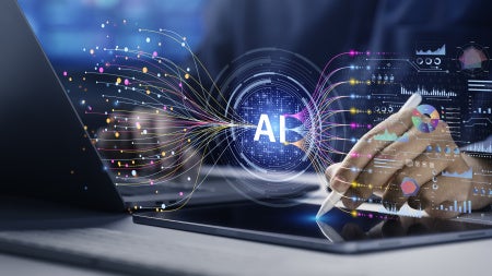 Image of a human working with AI software systems