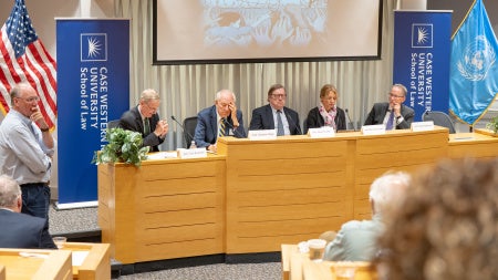 5 panelists speak to an audience