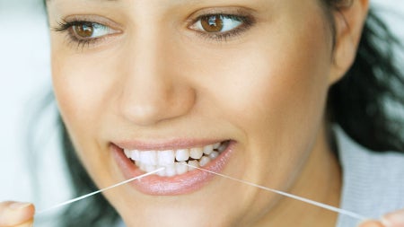 woman-flossing