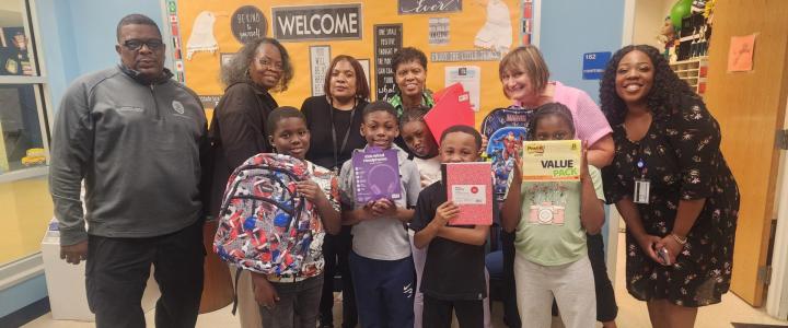 Staff members of Project STEP-UP partner with the CWRU Staff Advisory Council to donate supplies to students of Daniel E. Morgan School. 