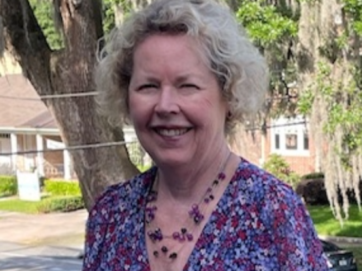 Linda Leatherbury standing outside on beautiful sunny day