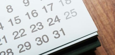 Photo of a calendar on a desk.