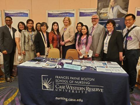 From left, Ron Hickman, Carol Musil, Joachim Voss and Mary Quinn Griffin with Thai faculty and alumni