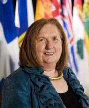 Formal portrait of Dr. Judith Shamian smiling.
