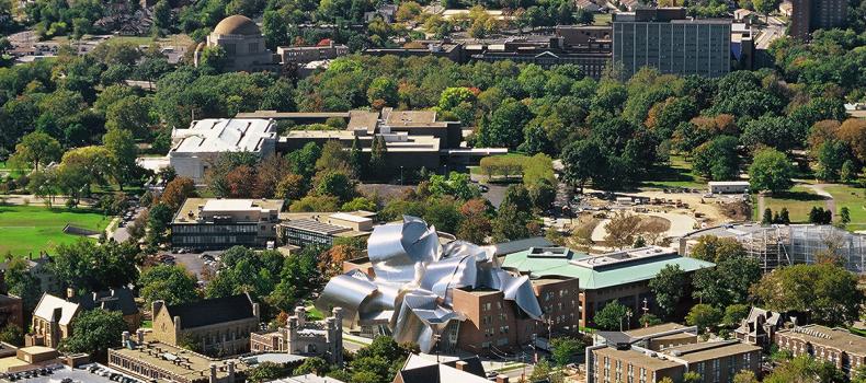 Aerial photo of CWRU campus with Cleveland skyline in background