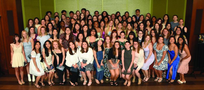 Group of nursing students pose for photo at graduation