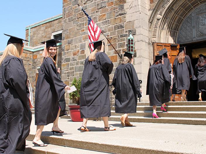 Photo of CWRU FPB nursing students walking into a building for commencement.