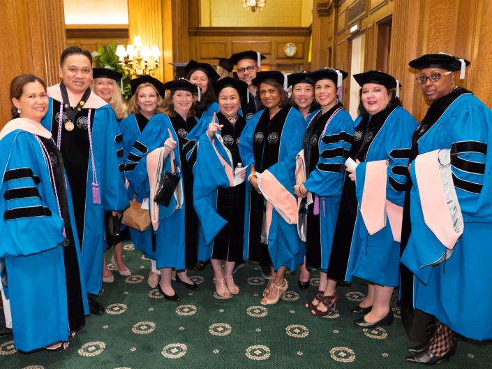 Group photo of DNP Graduates smiling.