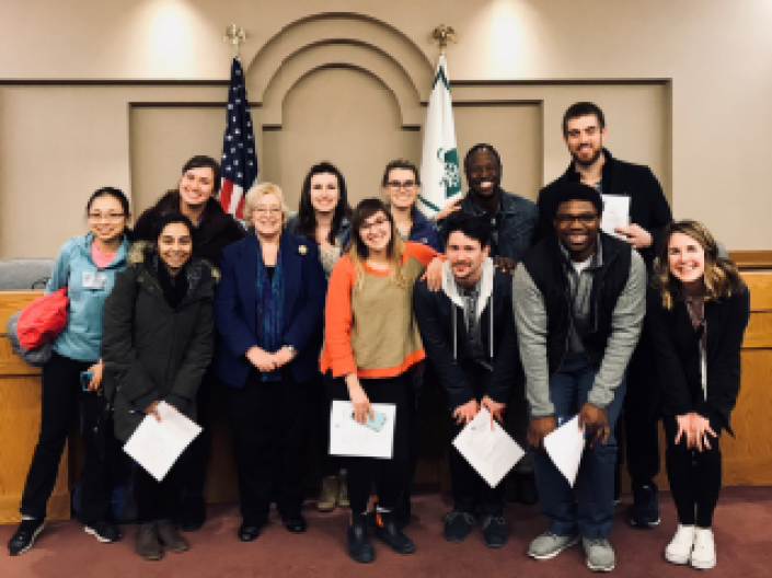 Health Policy students posing for a picture after a Cleveland Heights City Council meeting