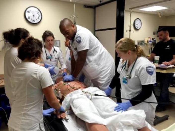 MN students practicing a code blue on a dummy