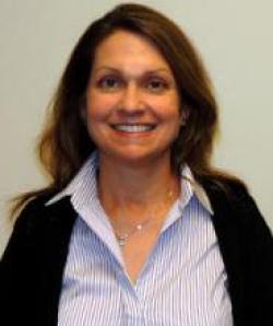 Headshot of Amy Petrinec smiling.