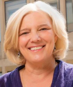 Headshot of Carol Musil smiling.