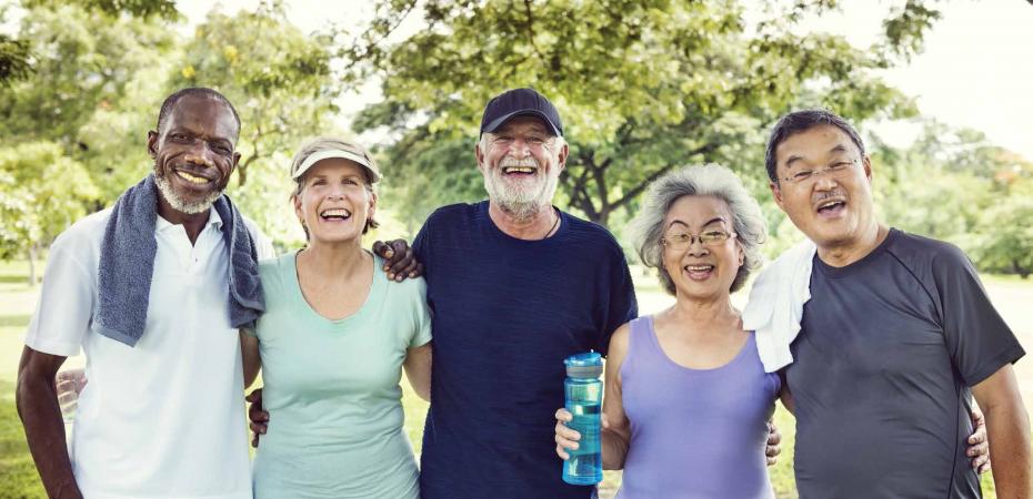 Stock image of older adults wearing athletic or work out clothing while outside.