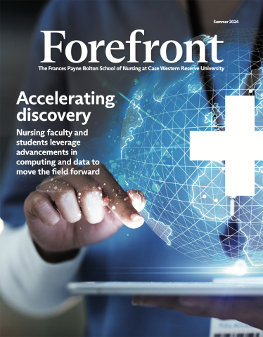 cover of Forefront magazine, with a nurses hand hovering over a digital tablet