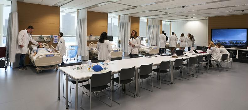 Students working in the Clinical Teaching Bed Lab at the Health Education Campus at Case Western Reserve University.