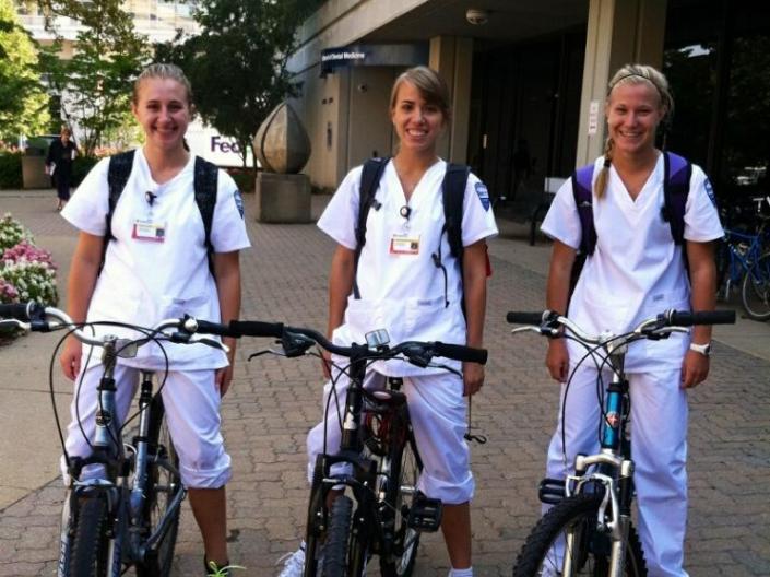 Students posing on their bikes before their first day of clinicals.