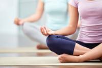 two people meditating