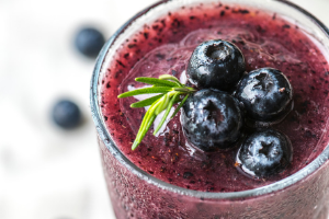 closeup of blueberry and acai smoothie