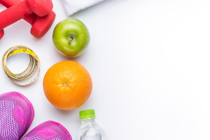White background with fruit and purple shoes on side