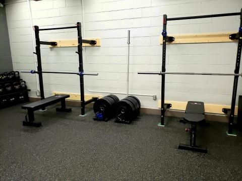 Two exercise barbell racks