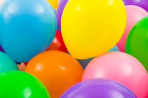 close up of multi colored balloons