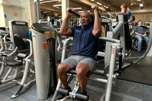 Man on abdominal machine in a gym
