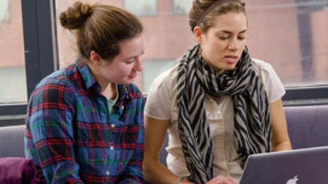 Two women using Mac computer Master of Science in Social Administration Aside