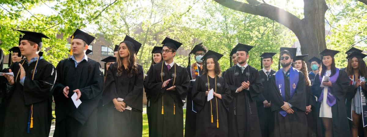 cwru graduates lined up before commencement ceremony