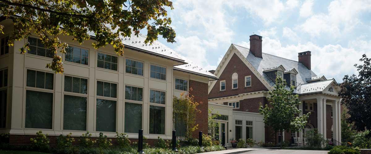 Exterior of the Linsalata Alumni Center at CWRU, with the center in the foreground and alumni house in background
