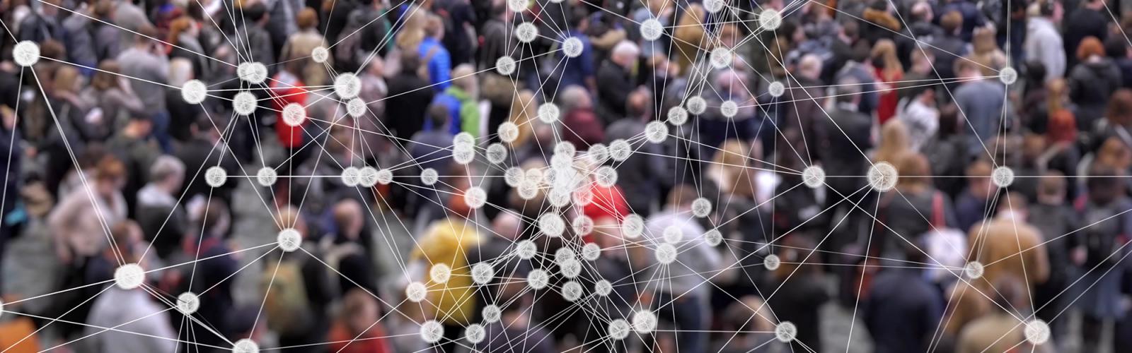 A crowd of people with an overlay of dots being connected by lines