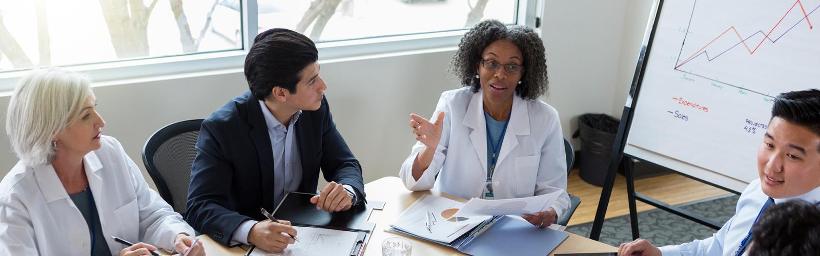 Doctors meeting with administrators