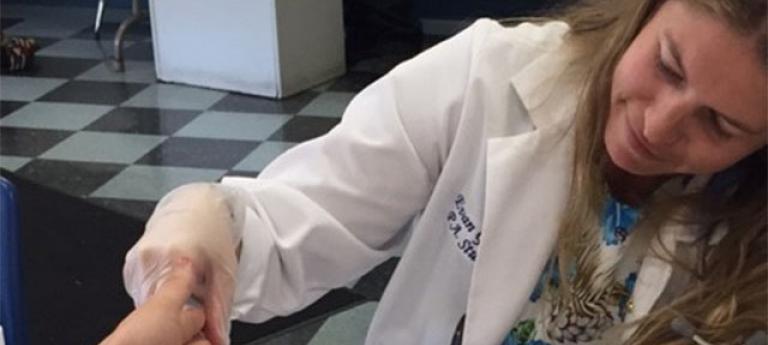 Physician Assistant Studies working with a patient