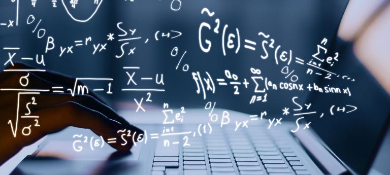 A computer with math formulas over the top of the image