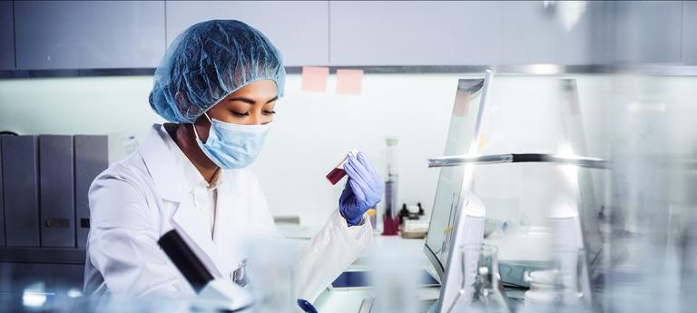 Pathology student working in a lab