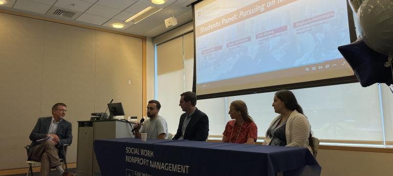 MNO students speaking at a panel