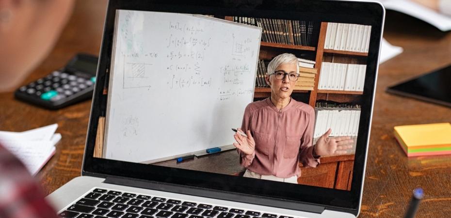 A student watching an online lecture