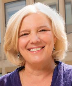 Headshot of Carol Musil smiling.