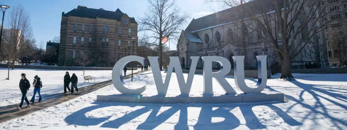 CWRU logo sign in the snow.