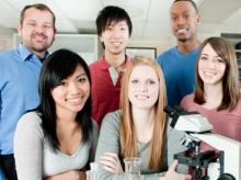 A group of postdocs smiling