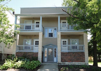 Front of creme and brick four suite home in University Circle, Cleveland Ohio
