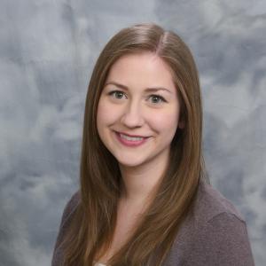 A formal headshot of Leah Zagore.