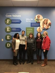Marissa Jones (second from right) and externship supervisor Kristen Milzelbank (middle) with other members of the programs and advocacy department