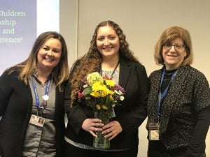 Case Western Reserve University extern Zoë Sykes-Varnhagen posed with two other females