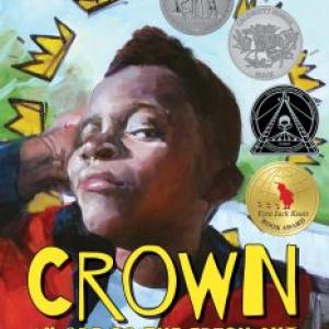 Book cover of the picture book Crown showing a young African American boy proudly showing off his new haircut